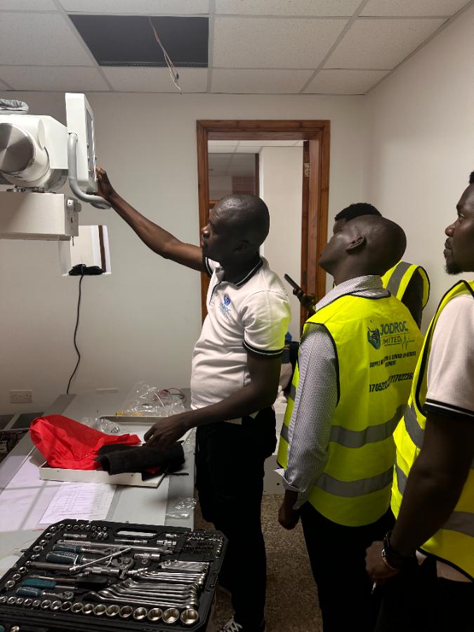 Jodroc engineers mounting an X-ray detector panel, part of the intraoral x-ray vs panoramic vs CBCT installation